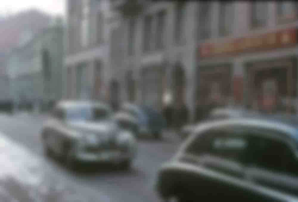 Cars pass a second-hand bookstore in central Moscow.